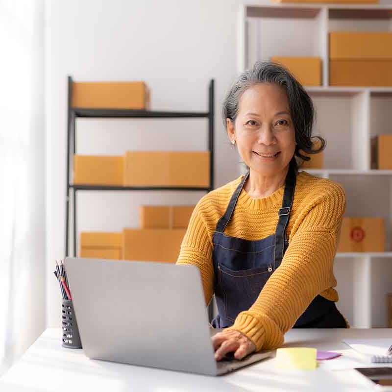 asian-senior-female-e-commerce-entrepreneur-checki-2026-01-06-09-56-51-utc