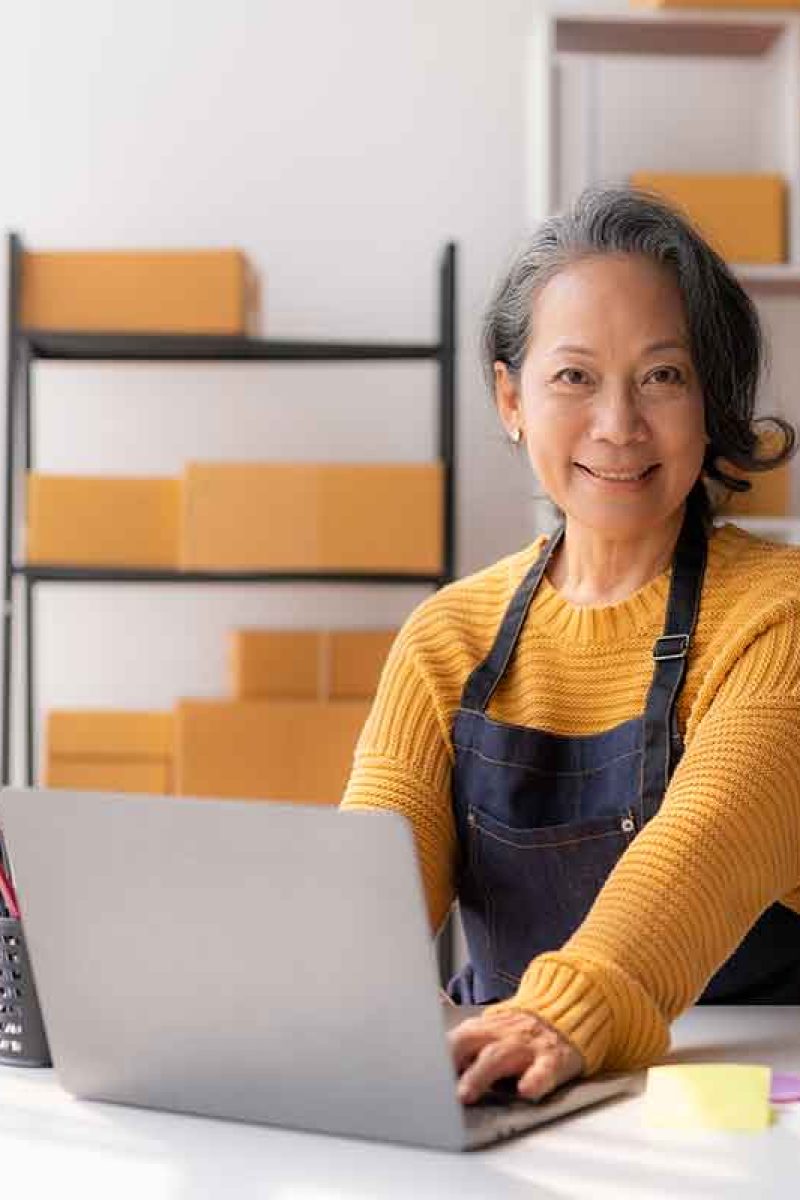 asian-senior-female-e-commerce-entrepreneur-checki-2026-01-06-09-56-51-utc