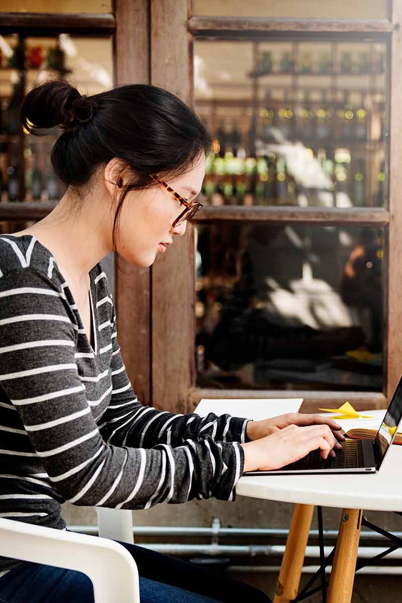 woman-laptop-browsing-searching-social-networking-2026-03-18-11-50-29-utc