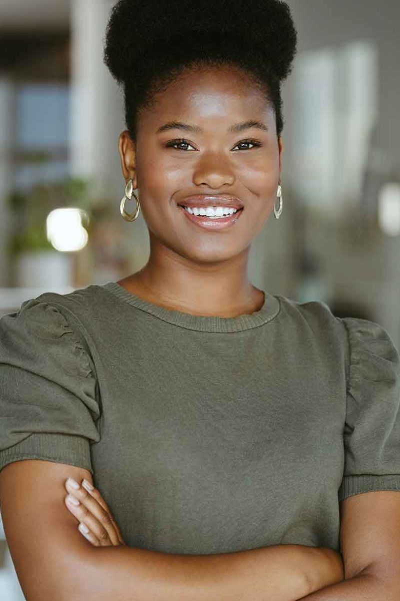 young-happy-african-american-businesswoman-standin-2026-03-25-03-43-13-utc